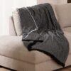 Plaid-Namibia-Zwart-katoen-over-bank Plaid Namibia zwart - Premium Belmarti® kwaliteit